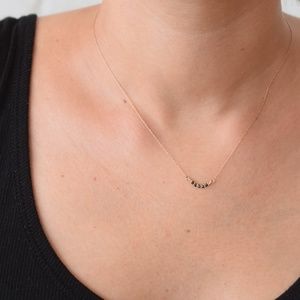 14KT GOLD BLACK DIAMOND CURVE PENDANT